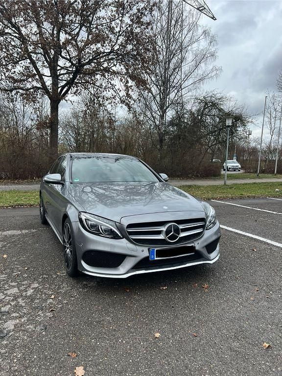 Grau Gebraucht 2015 Mercedes C400 AMG line Limousine | 22.990 € (Fairer Preis) - Bild 1/4