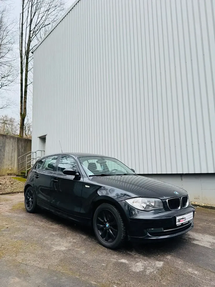 Gebraucht BMW 116 122 PS (89 kW) 2008 Schwarz Kleinwagen