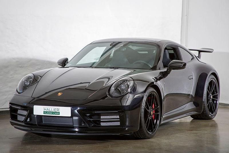 Tiefschwarz Gebraucht 2024 Porsche 911 Carrera GTS Coupé | 175.000 € (Teuer) - Bild 1/4