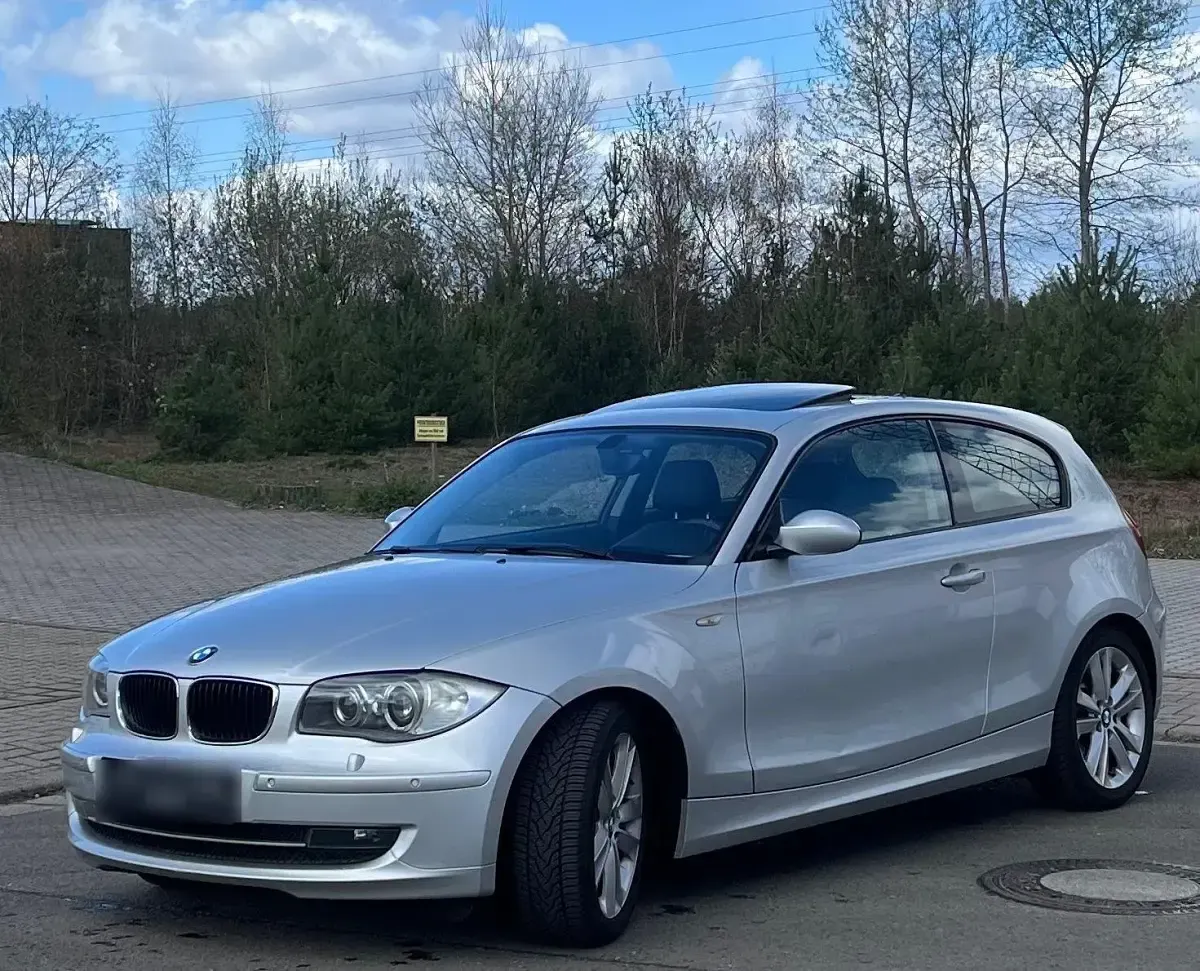 Używany BMW 116 122 KM (89 kW) 2008 Srebrny Hatchback