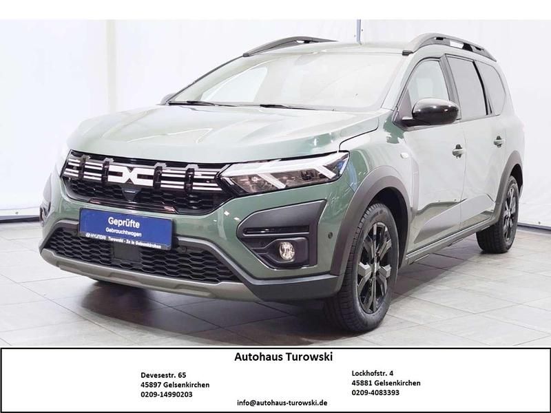 Staubgrau Gebraucht 2023 Dacia Jogger Extreme Van / Kleinbus | 18.740 € (Fairer Preis) - Bild 1/4