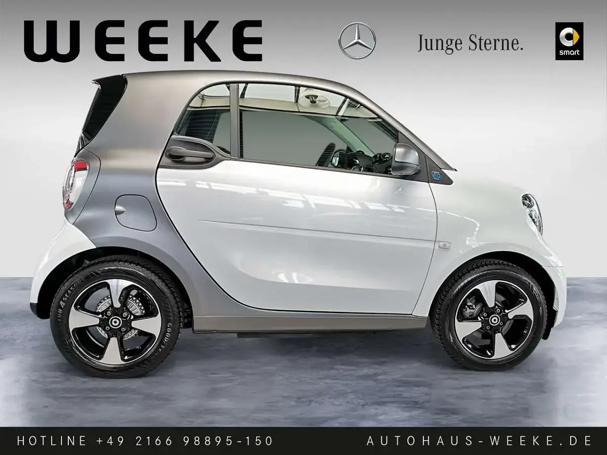 Gebraucht Smart ForTwo Coupé Passion Exclusive 60 kW (82 PS) 2024 Weiß Kleinwagen