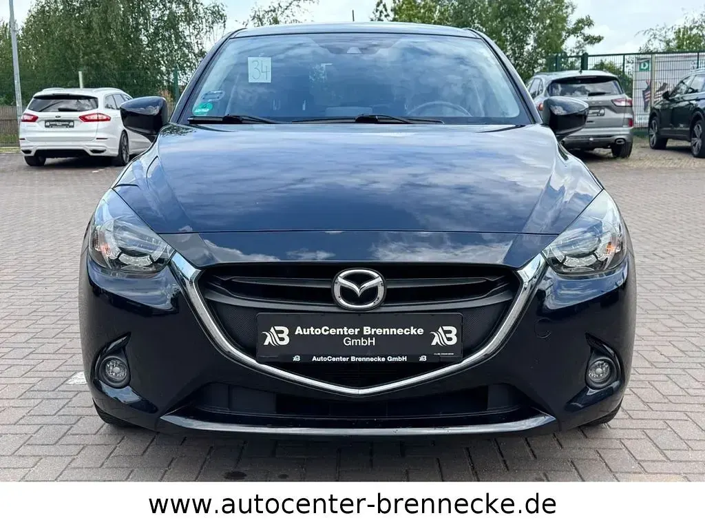 Używany Mazda 2 Nakama 90 KM (66 kW) 2016 Czarny Sedan/Limuzyna