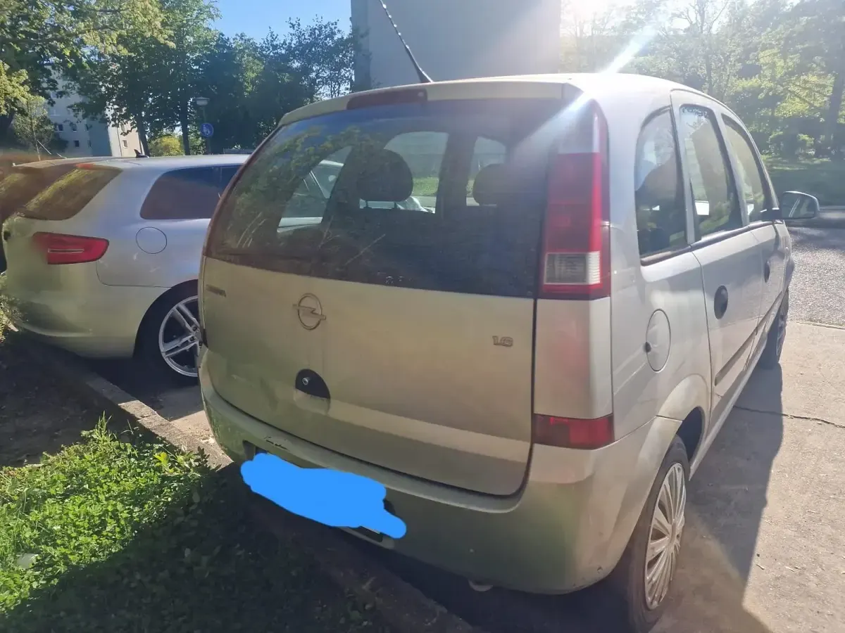 Second-hand Opel Meriva 106 CP (77 kW) 2003 Argintiu Monovolum
