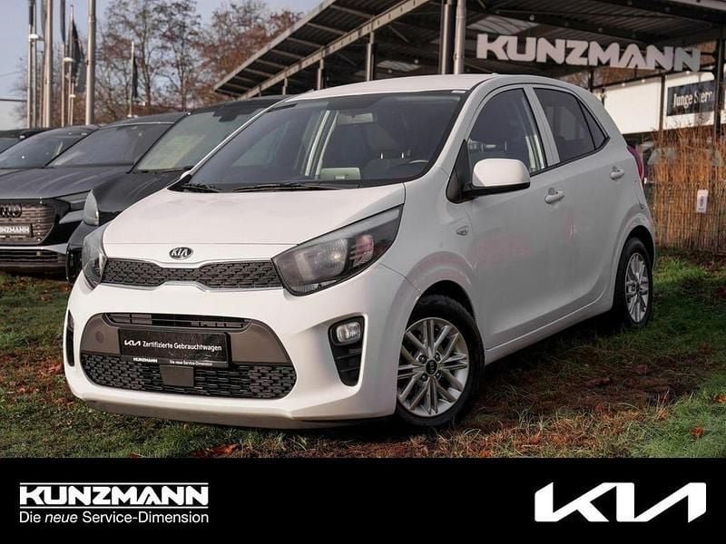 Schneeweiß Gebraucht 2020 Kia Picanto DREAM-TEAM Edition Kleinwagen | 11.850 € (Fairer Preis) - Bild 1/4