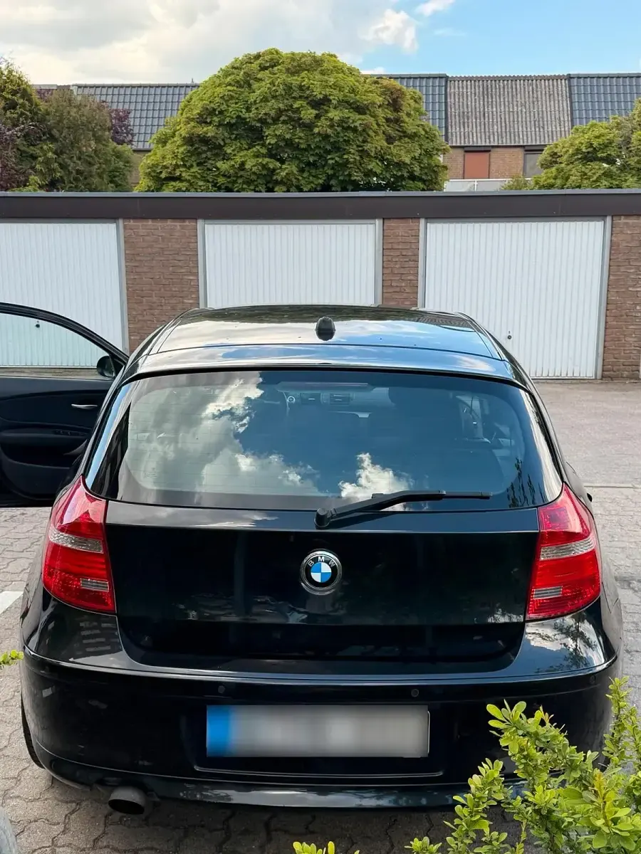 Gebraucht BMW 116 122 PS (89 kW) 2007 Schwarz Kleinwagen