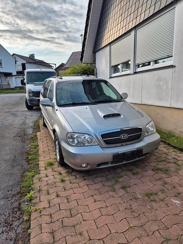 Silber Gebraucht 2004 Kia Carnival Van / Kleinbus | 1.200 € (Guter Preis) - Bild 1/4
