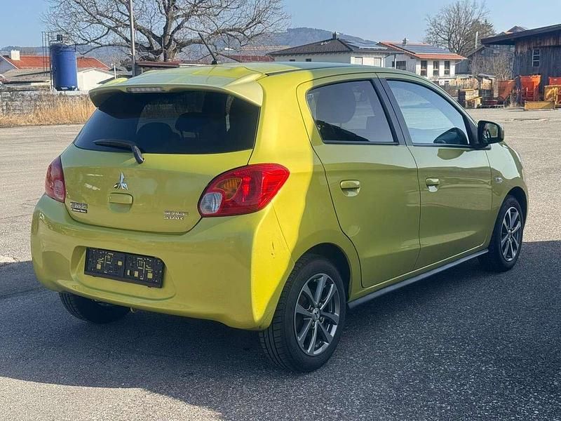 Gebraucht Mitsubishi Space Star Diamant Edition 80 PS (58 kW) 2015 Karambolagelb (m) Kleinwagen