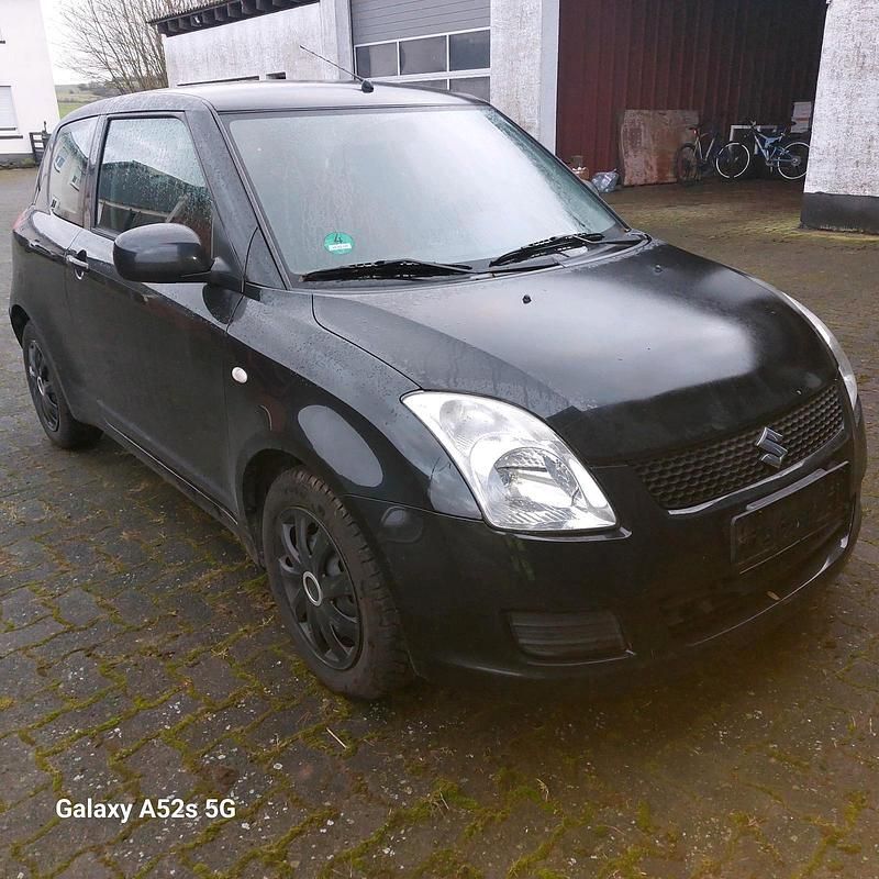 Gebraucht Suzuki Swift 90 PS (66 kW) 2012 Schwarz Kleinwagen