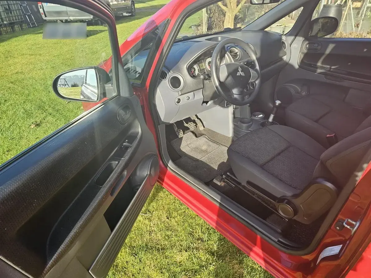 Gebraucht Mitsubishi Colt 75 PS (55 kW) 2009 Rot Kleinwagen