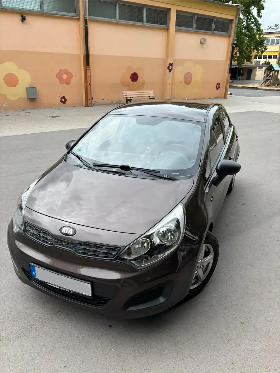 Gebraucht Kia Rio 84 PS (61 kW) 2012 Braun Kleinwagen
