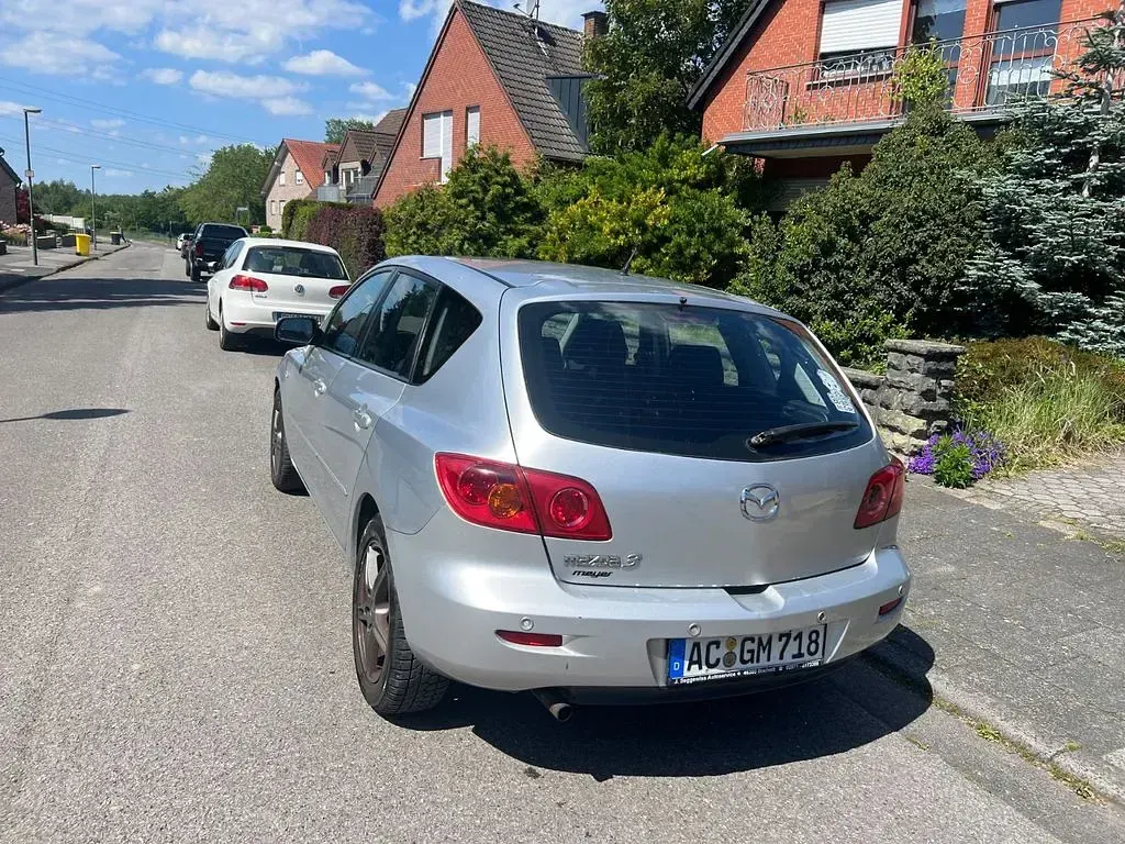 Używany Mazda 3 Active 105 KM (77 kW) 2005 Srebrny Sedan/Limuzyna