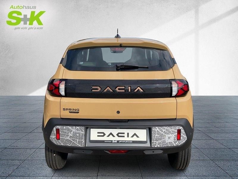 Używany Dacia Spring Extreme 48 kW (66 KM) 2025 Beżowy Hatchback