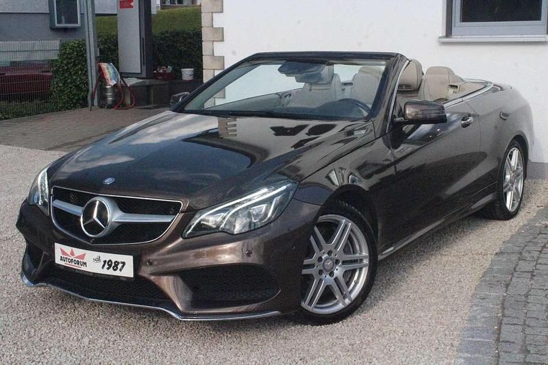 Braun Gebraucht 2014 Mercedes E50 AMG AMG Limousine | 32.490 € - Bild 1/4