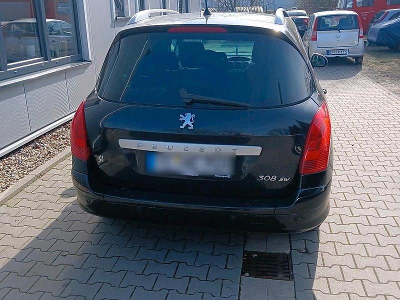Gebraucht Peugeot 308 SW 109 PS (80 kW) 2010 Schwarz Kombi