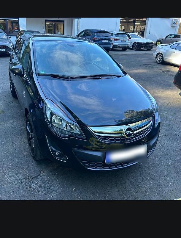 Second-hand Opel Corsa Active 100 CP (73 kW) 2014 Negru Hatchback