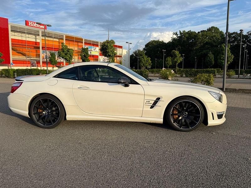 Weiß Gebraucht 2013 Mercedes SL63 AMG AMG Cabrio | 70.990 € (Teuer) - Bild 1/4
