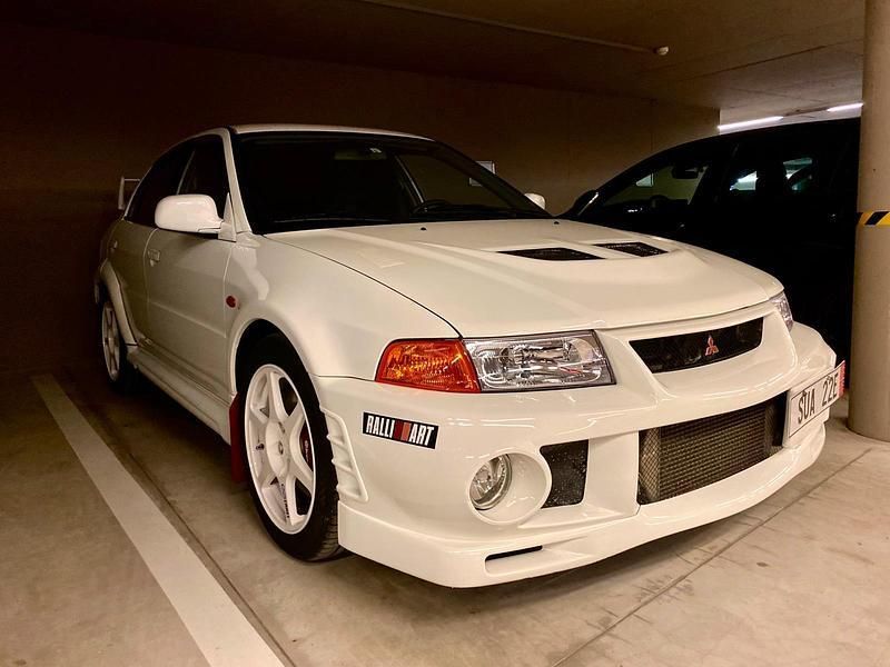 Weiß Gebraucht 1999 Mitsubishi Lancer Limousine | 53.000 € - Bild 1/4