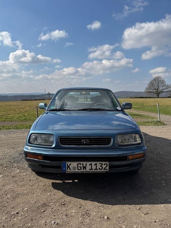 Blau Gebraucht 1995 Daihatsu Applause Limousine | 2.499 € - Bild 1/4