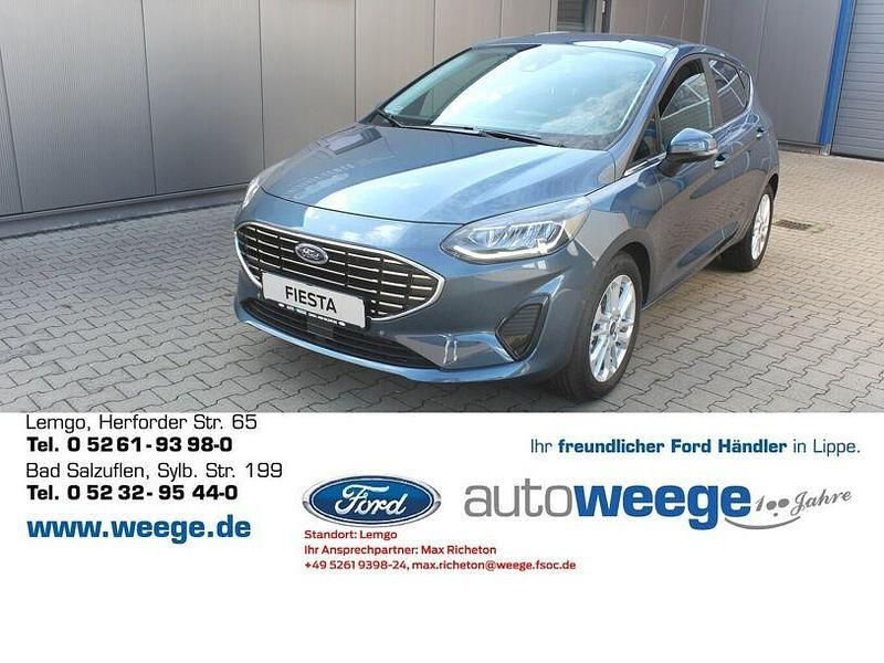 Blau (metallic) Gebraucht 2023 Ford Fiesta Titanium Kleinwagen | 16.990 € (Fairer Preis) - Bild 1/4