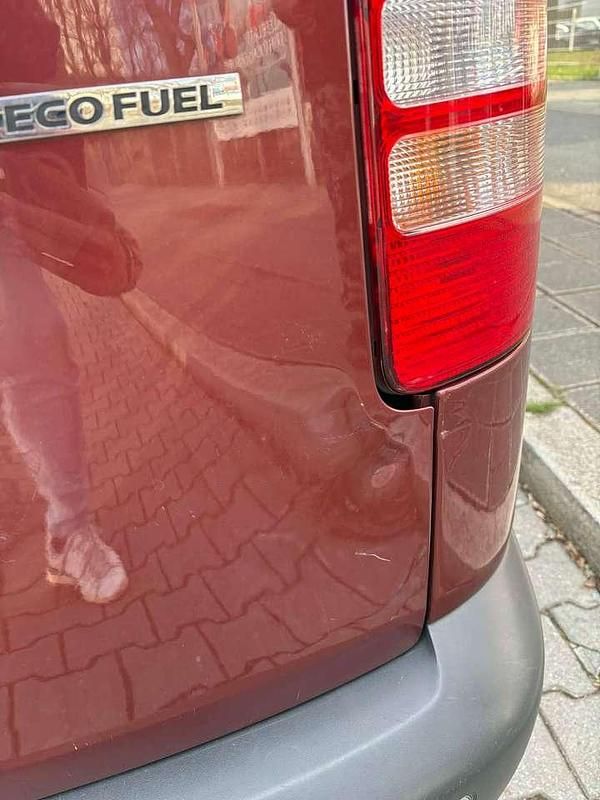 Gebraucht VW Caddy Team 109 PS (80 kW) 2013 Rot Van / Kleinbus