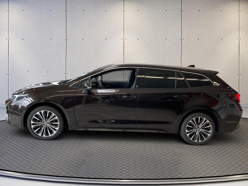 Gebraucht Toyota Corolla Team 196 PS (144 kW) 2023 Phantombraun metallic Kombi