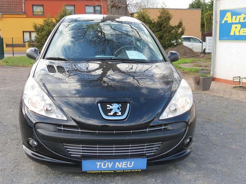 Gebraucht Peugeot 206 73 PS (53 kW) 2012 Schwarz Kleinwagen