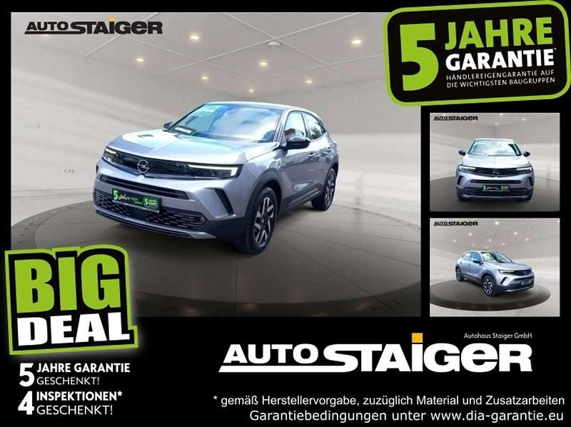 Quarzsilber Gebraucht 2024 Opel Mokka Elegance SUV | 21.990 € (Fairer Preis) - Bild 1/4