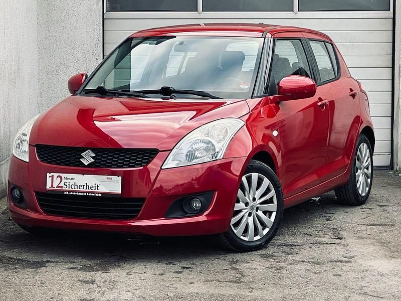 Rot Gebraucht 2012 Suzuki Swift Kleinwagen | 5.499 € (Fairer Preis) - Bild 1/4
