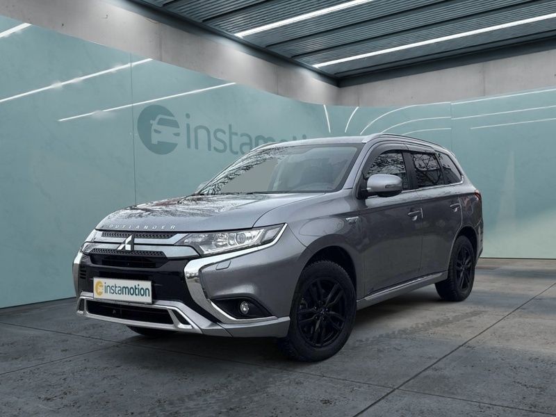 Grau Gebraucht 2020 Mitsubishi Outlander P-HEV Spirit SUV | 23.160 € (Fairer Preis) - Bild 1/3