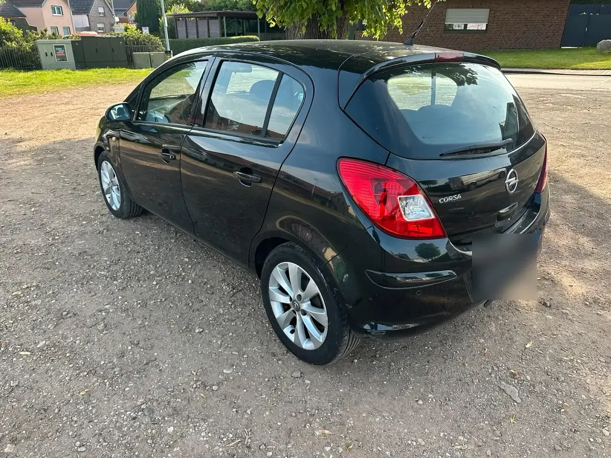 Gebraucht Opel Corsa Active 87 PS (63 kW) 2013 Schwarz Kleinwagen