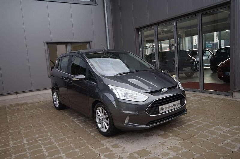 Magnetic grau Gebraucht 2014 Ford B-MAX Titanium Van / Kleinbus | 9.830 € (Fairer Preis) - Bild 1/4
