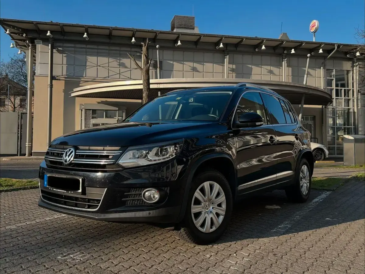 Second-hand VW Tiguan Sportline 160 CP (117 kW) 2014 Negru SUV