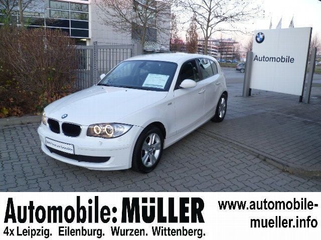 Weiß Gebraucht 2008 BMW 118 Comfort Edition Kleinwagen | 16.401 € - Bild 1/4