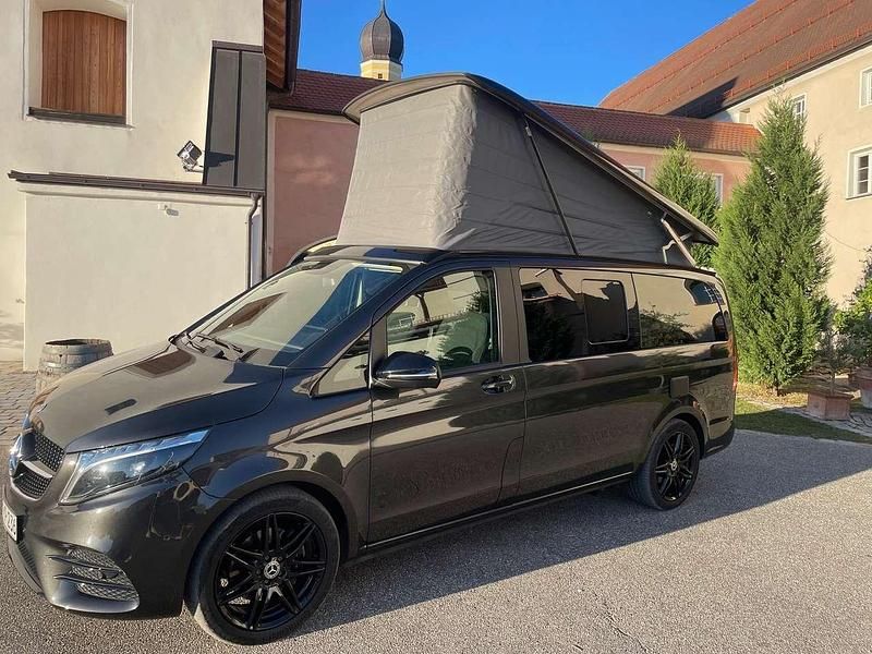 Graphitgrau metallic dunkel Gebraucht 2023 Mercedes V300 Marco Polo Van / Kleinbus | 68.900 € (Guter Preis) - Bild 1/4