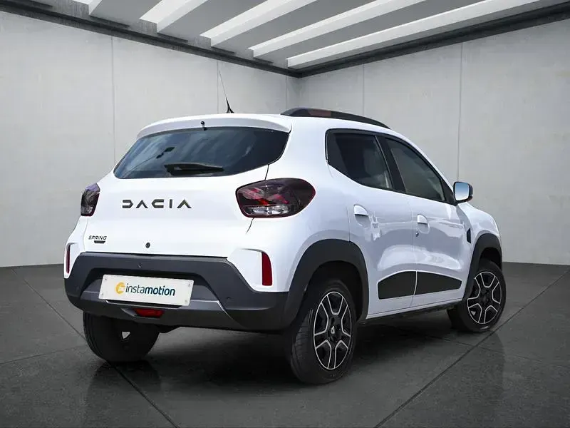 Gebraucht Dacia Spring Extreme 19 kW (26 PS) 2023 Weiß Kleinwagen