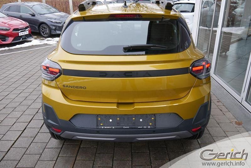 Neu Dacia Sandero Expression 110 PS (80 kW) 2026 Amber yellow Limousine