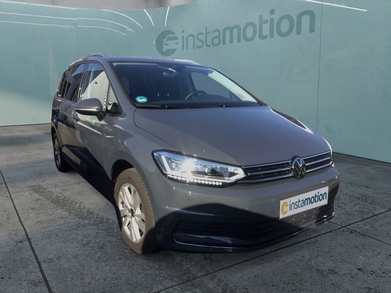 Grau Gebraucht 2024 VW Touran Move Van / Kleinbus | 34.640 € (Fairer Preis) - Bild 1/4