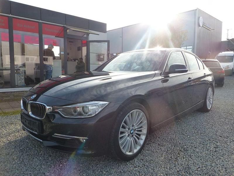 Schwarz Gebraucht 2012 BMW 320 Performance Limousine | 7.950 € - Bild 1/4