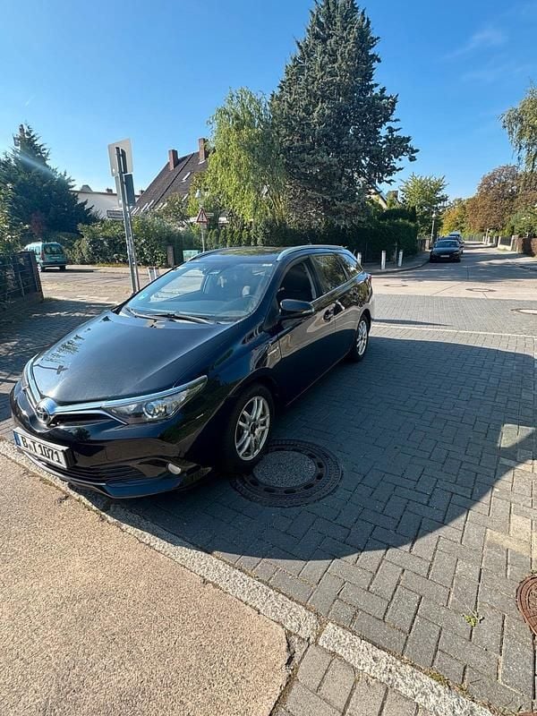 Schwarz Gebraucht 2017 Toyota Auris Hybrid Kombi | 10.900 € (Superpreis) - Bild 1/4