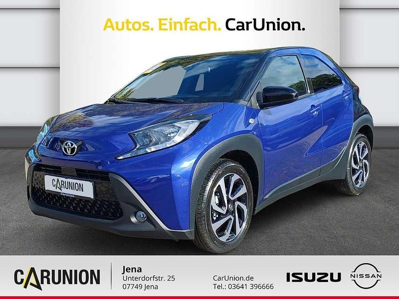 Juniper blue (8y8)/ black mica Gebraucht 2026 Toyota Aygo X SUV | 16.990 € (Fairer Preis) - Bild 1/4