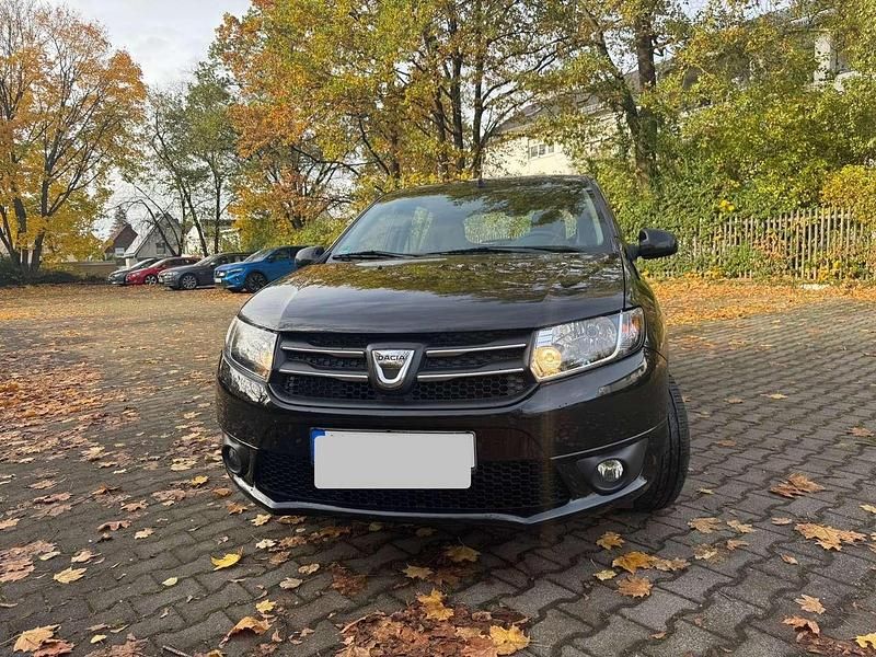 Schwarz Gebraucht 2013 Dacia Sandero Limousine | 2.750 € - Bild 1/4