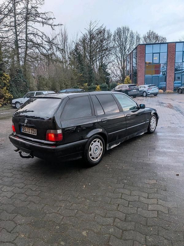 Gebraucht BMW 316 102 PS (75 kW) 1997 Schwarz Kombi