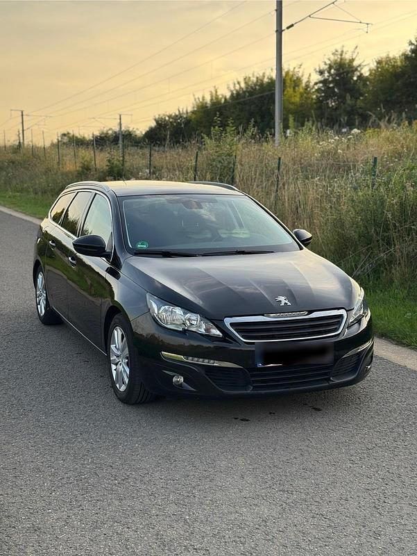 Gebraucht Peugeot 308 SW 120 PS (88 kW) 2015 Schwarz Kombi