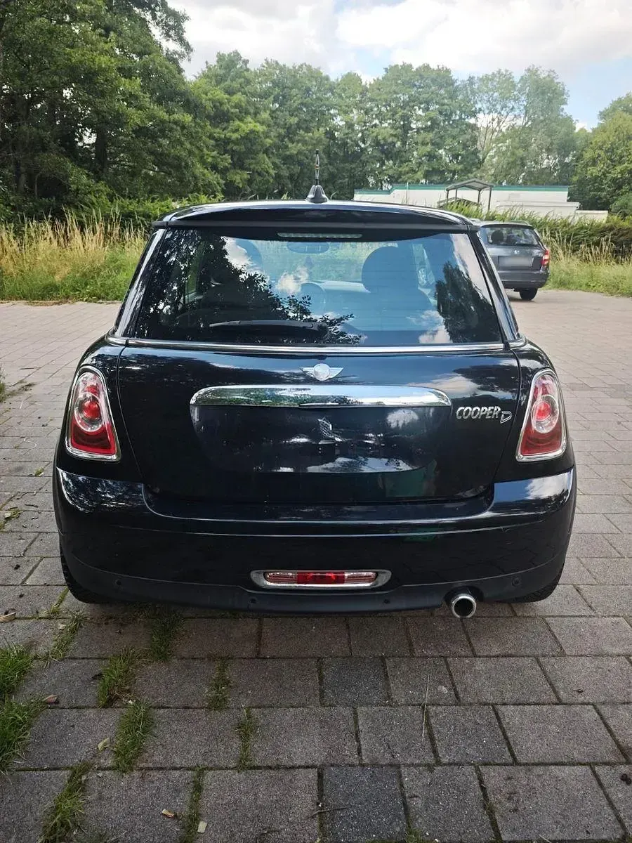 Gebraucht Mini Cooper D 118 PS (86 kW) 2011 Schwarz Kleinwagen