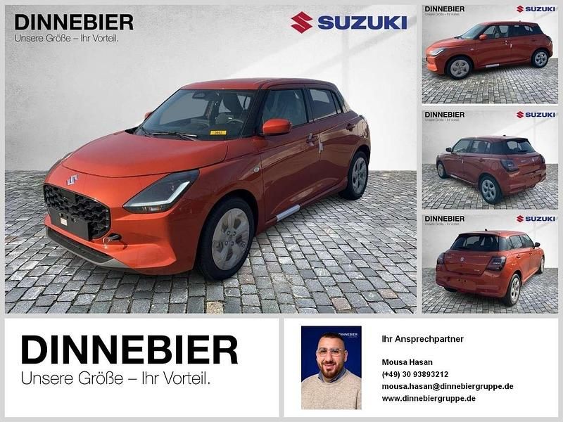 Flame orange pearl metallic Neu 2025 Suzuki Swift Comfort Kleinwagen | 17.998 € - Bild 1/3