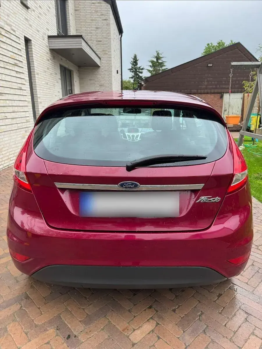 Second-hand Ford Fiesta Titanium 82 CP (60 kW) 2009 Roșu Berlinǎ