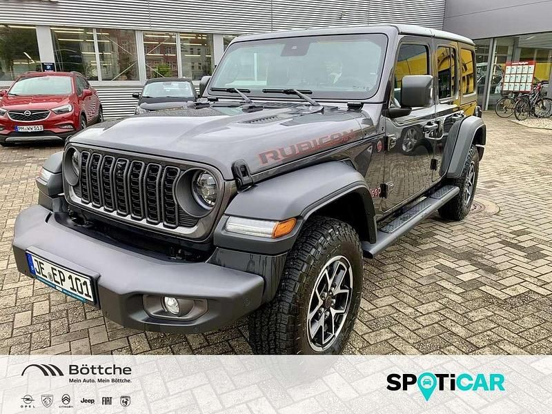 Grau Gebraucht 2024 Jeep Wrangler Rubicon SUV | 57.880 € (Fairer Preis) - Bild 1/4