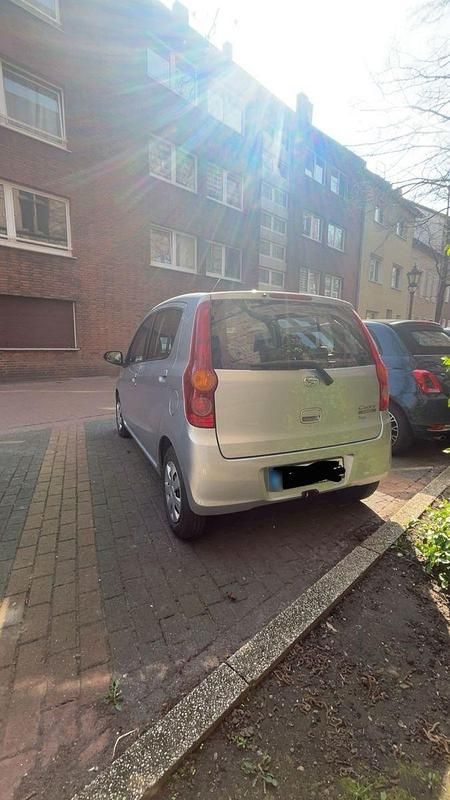 Gebraucht Daihatsu Cuore 69 PS (50 kW) 2009 Silber Kleinwagen