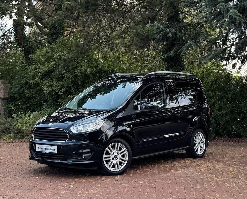 Schwarz Gebraucht 2015 Ford Tourneo Courier Titanium Van / Kleinbus | 8.499 € (Fairer Preis) - Bild 1/4